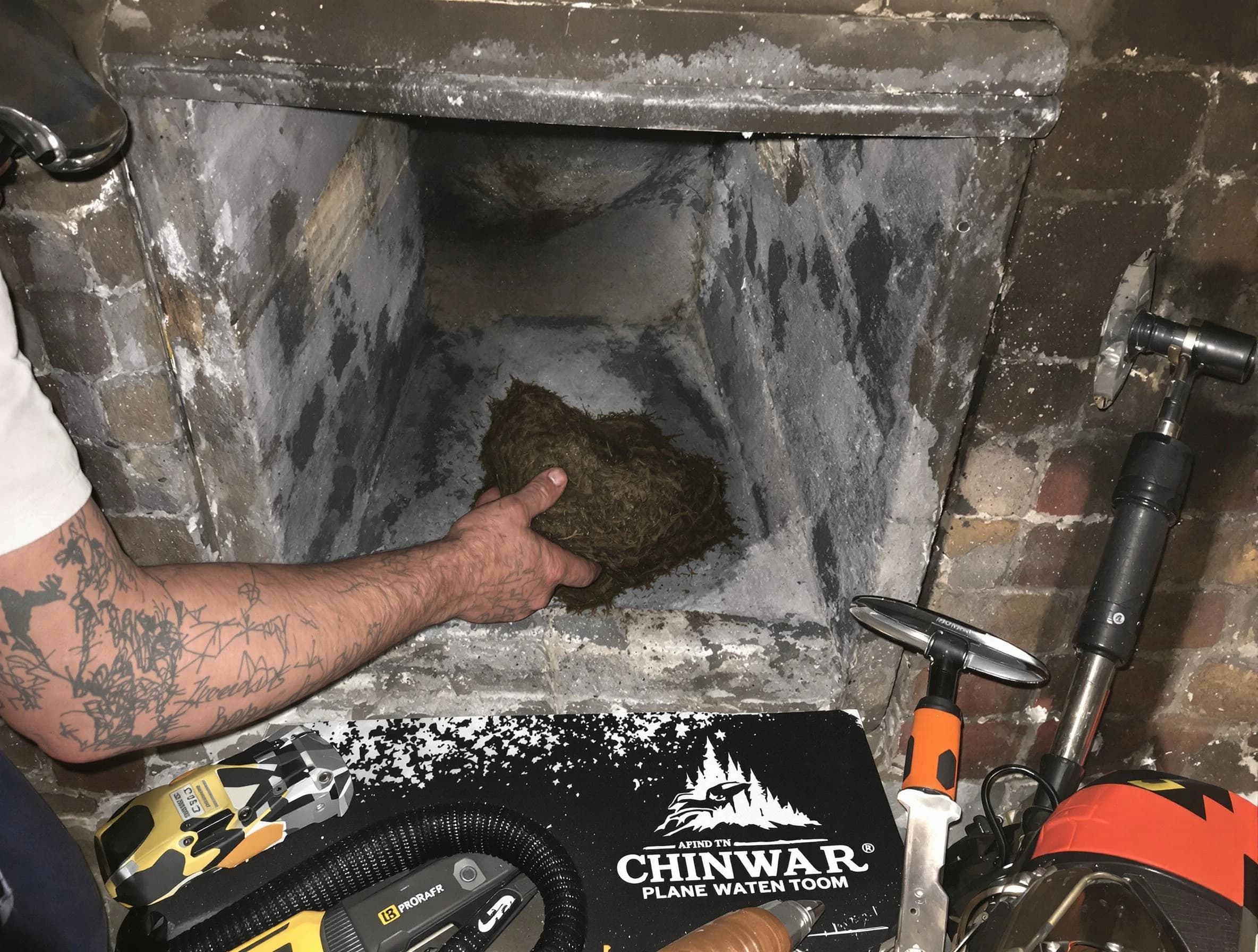 Florence Chimney Sweep safely removing debris and screening chimney in Florence, AZ