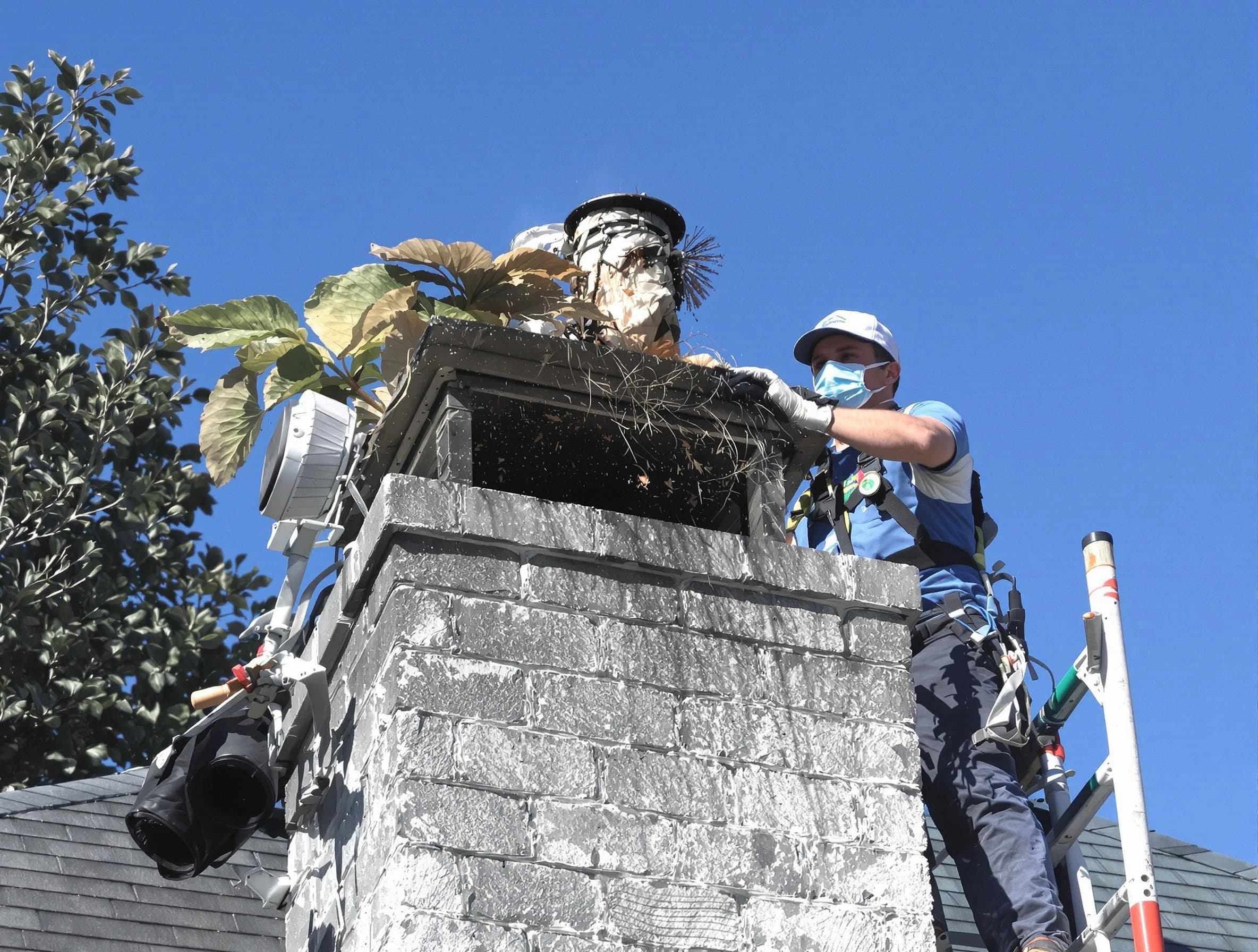 Florence Chimney Sweep specialist performing chimney cleaning in Florence, AZ